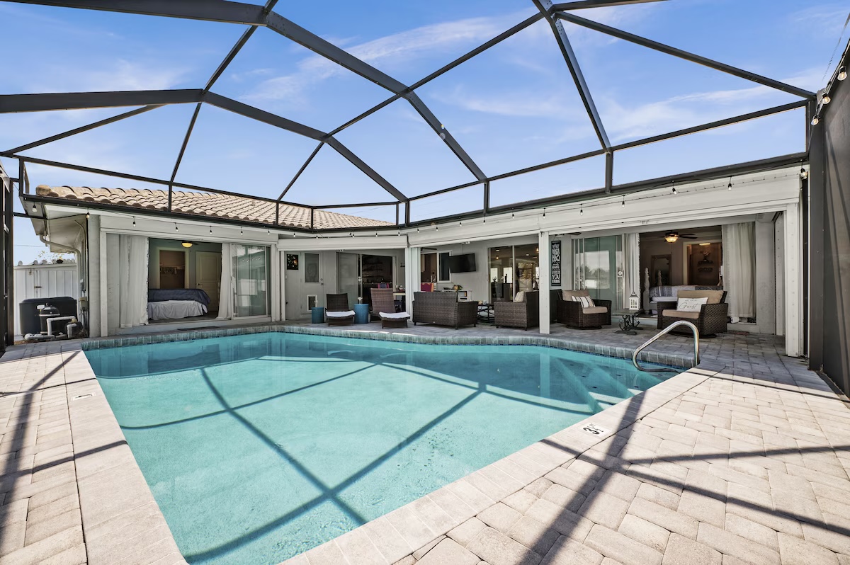 Heated screened-in pool during the day