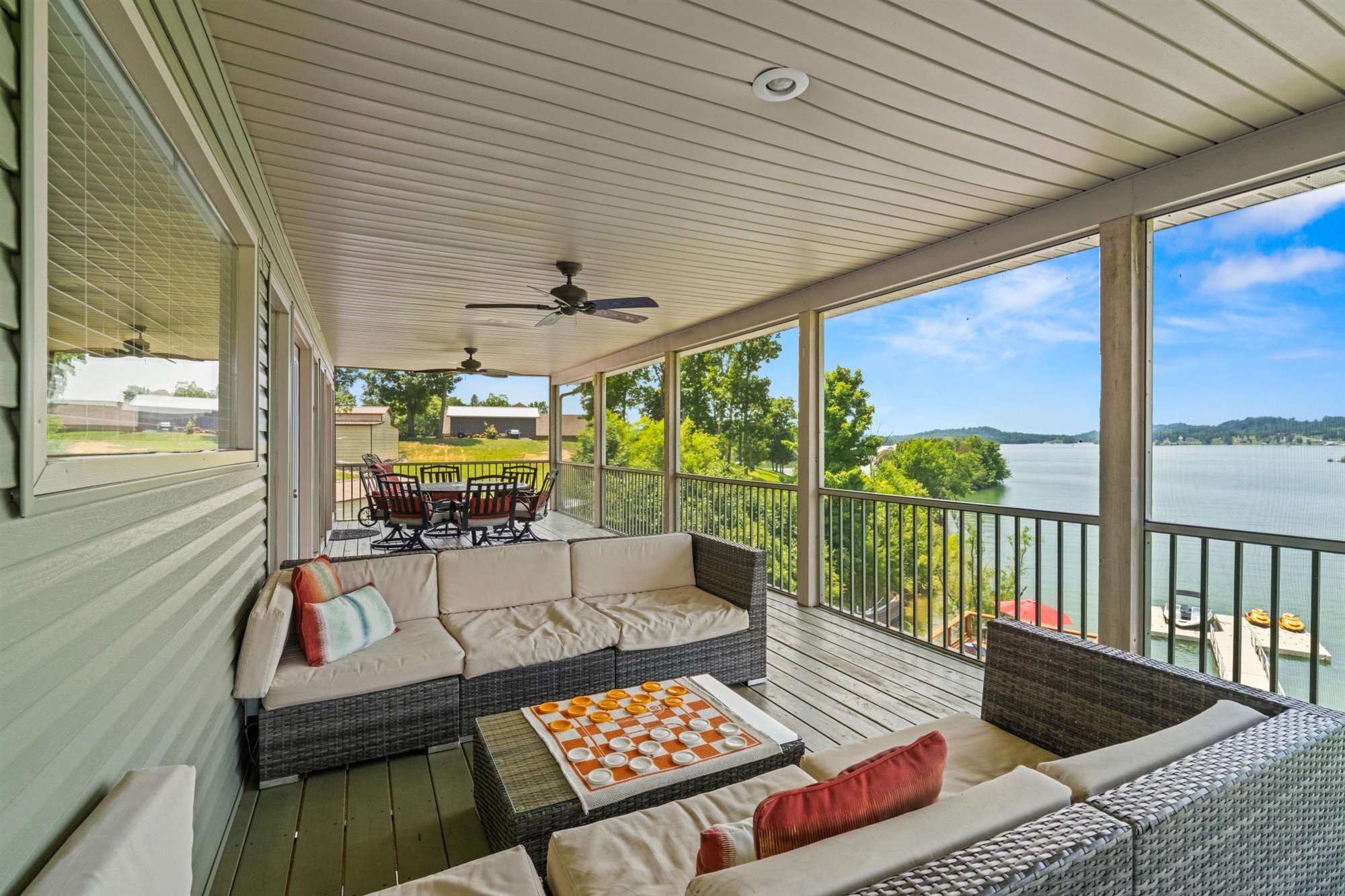 Screened-in porch with lake views