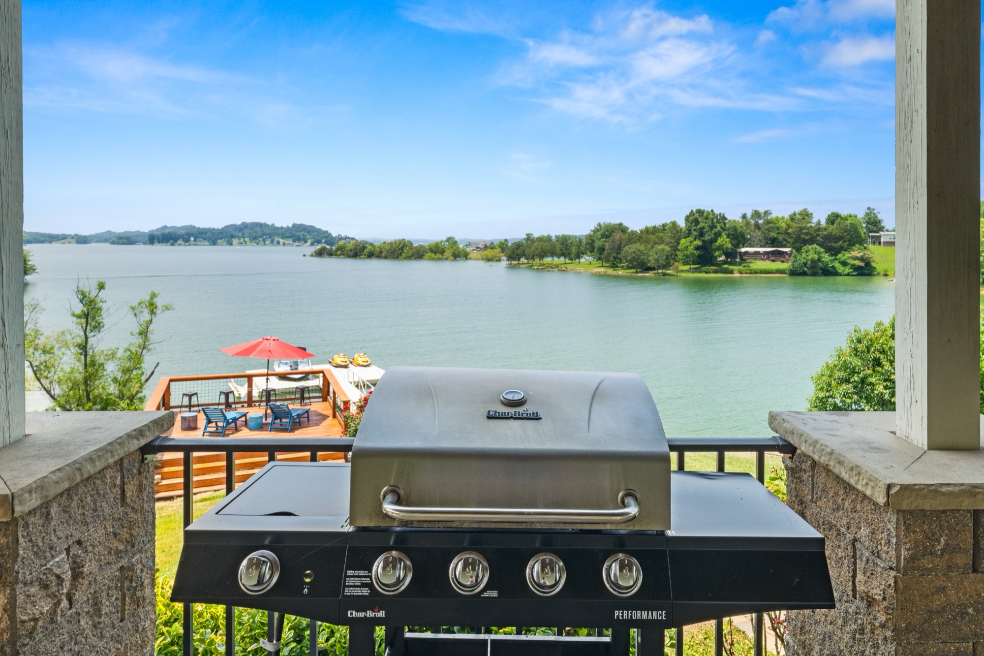 The downstairs grilling setup overlooking Douglas Lake and the sundeck